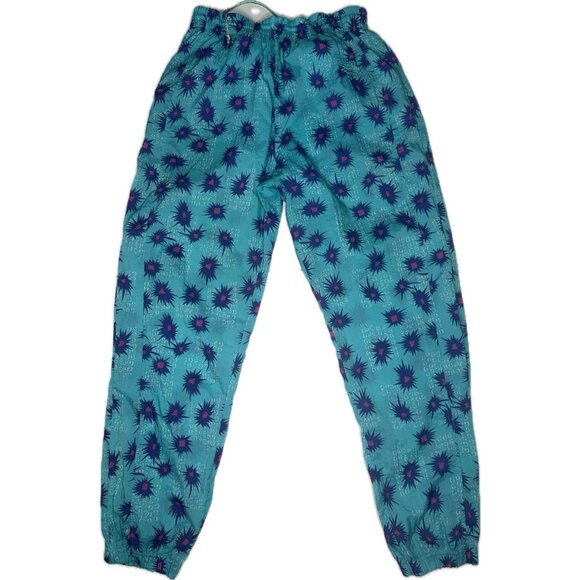 Vintage Reebok 90s Track Pants Teal Purple Star Print Windbreaker Unisex S - Picture 1 of 6